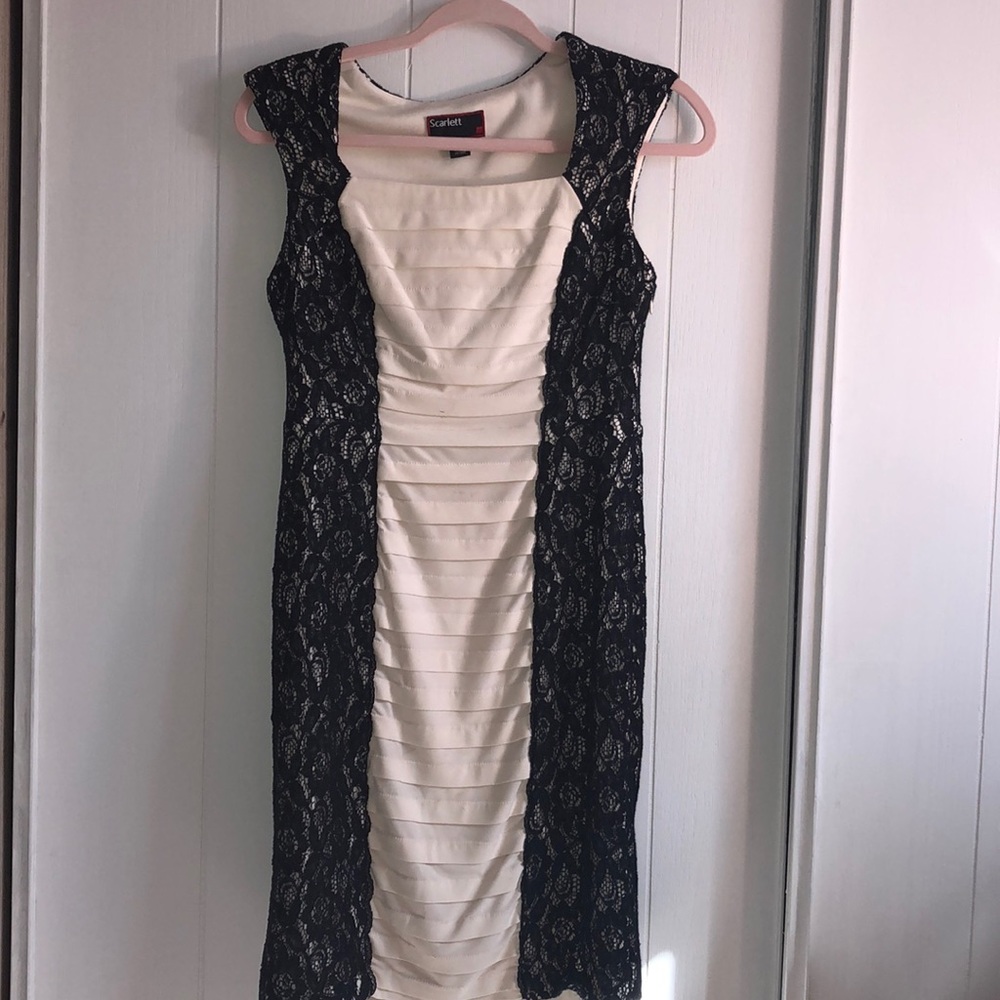 Elegant white and black lace dress